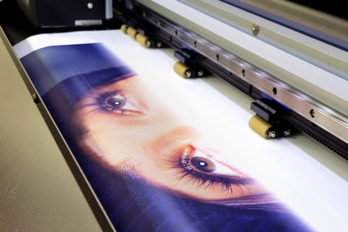 Large format printer producing a full-colour banner